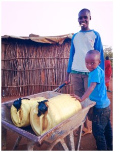 Salaash collecting water in a wheelbarrow... There's using your head.  (So you don't have to use your head.)